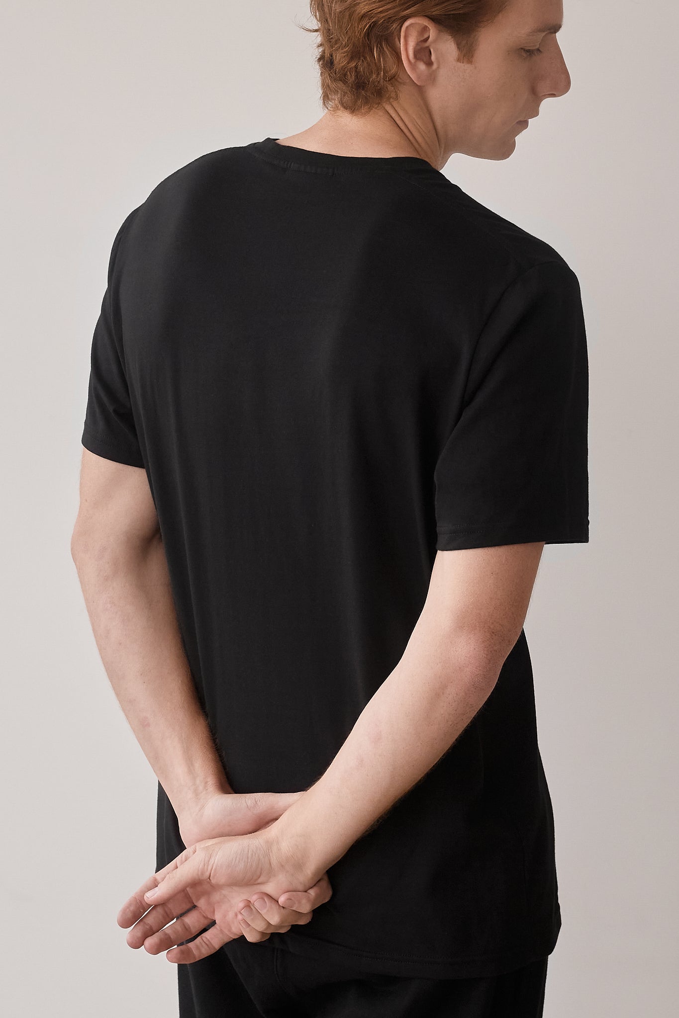 polo algodon organico negro espalda